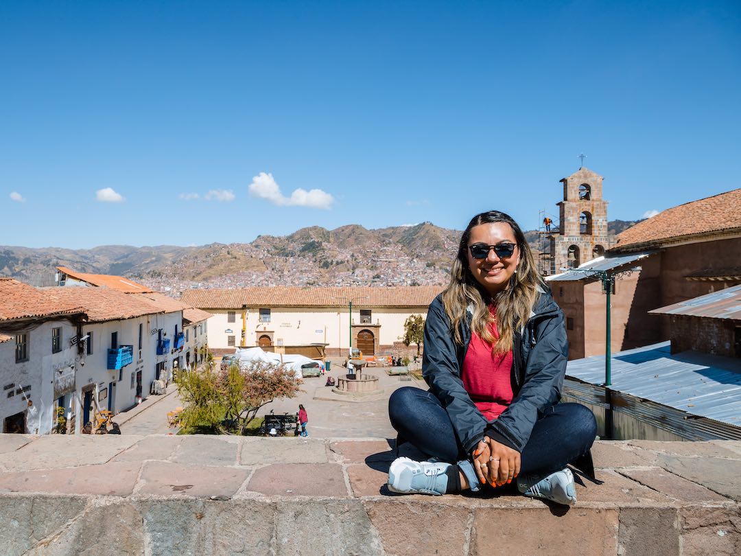 Tour group guest looking at view of Cusco