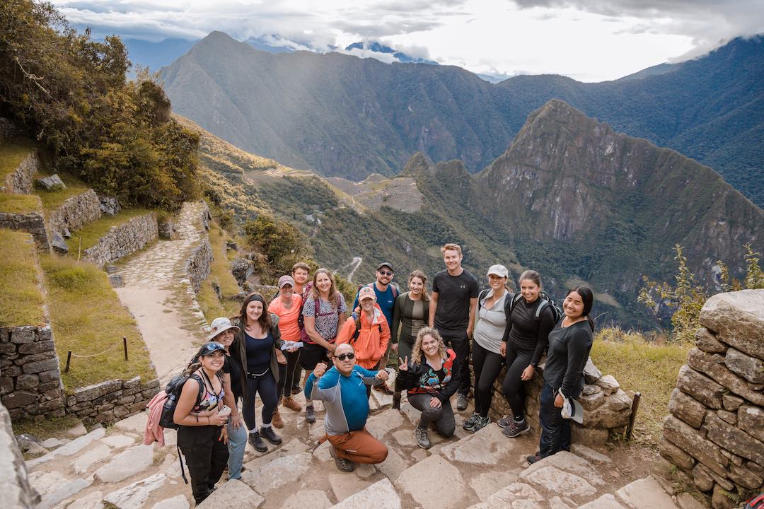 inca-trail-machu-picchu-46 Other Way Round Travel group photo from the sungate looking down to Machu Picchu