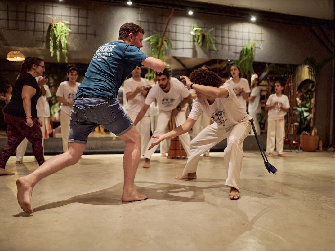 Practising Capoeira during our Brazil group tour