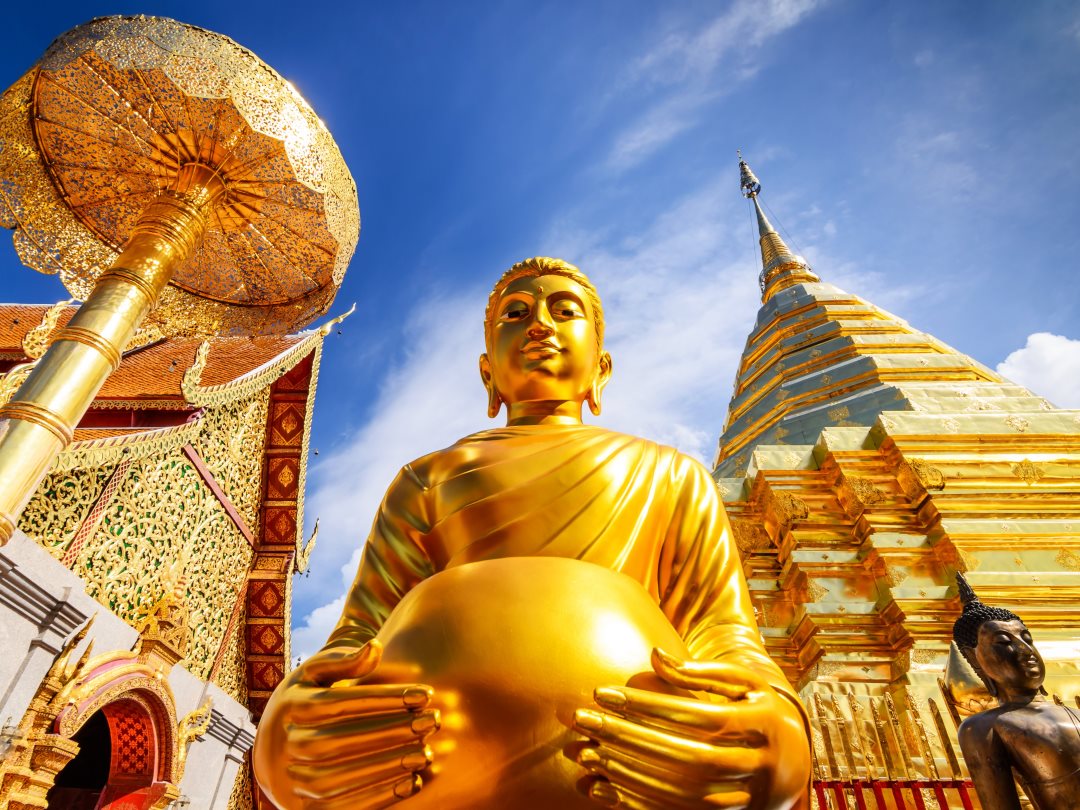 Exploring buddhist temples in Chiang Mai during Thailand group tour