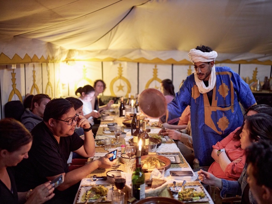 A dinner with Other Way Round Travel in a berber camp in the Sahara desert in Morocco