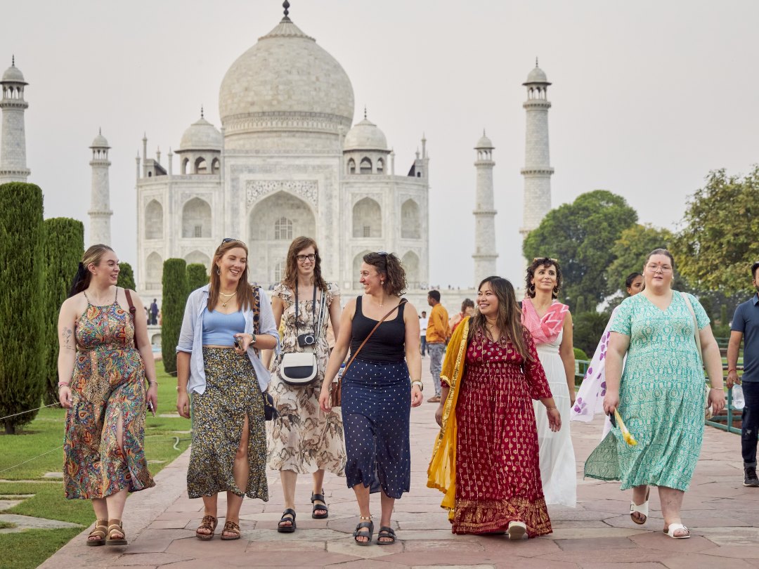 Visiting the Taj Mahal during an India group tour