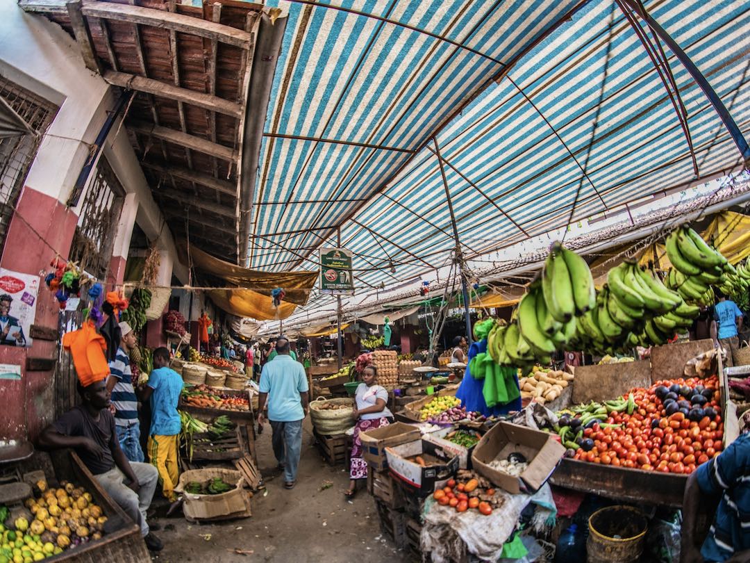 Variety of foods, potatoes, Ugali and dry fish, Chapati and beef stew, sausage and mandazi, samosa, Roasted potatoes chicken, rice vegetables kachumbari garnished  Kenya dishes during Kenya and Tanzanya group tour