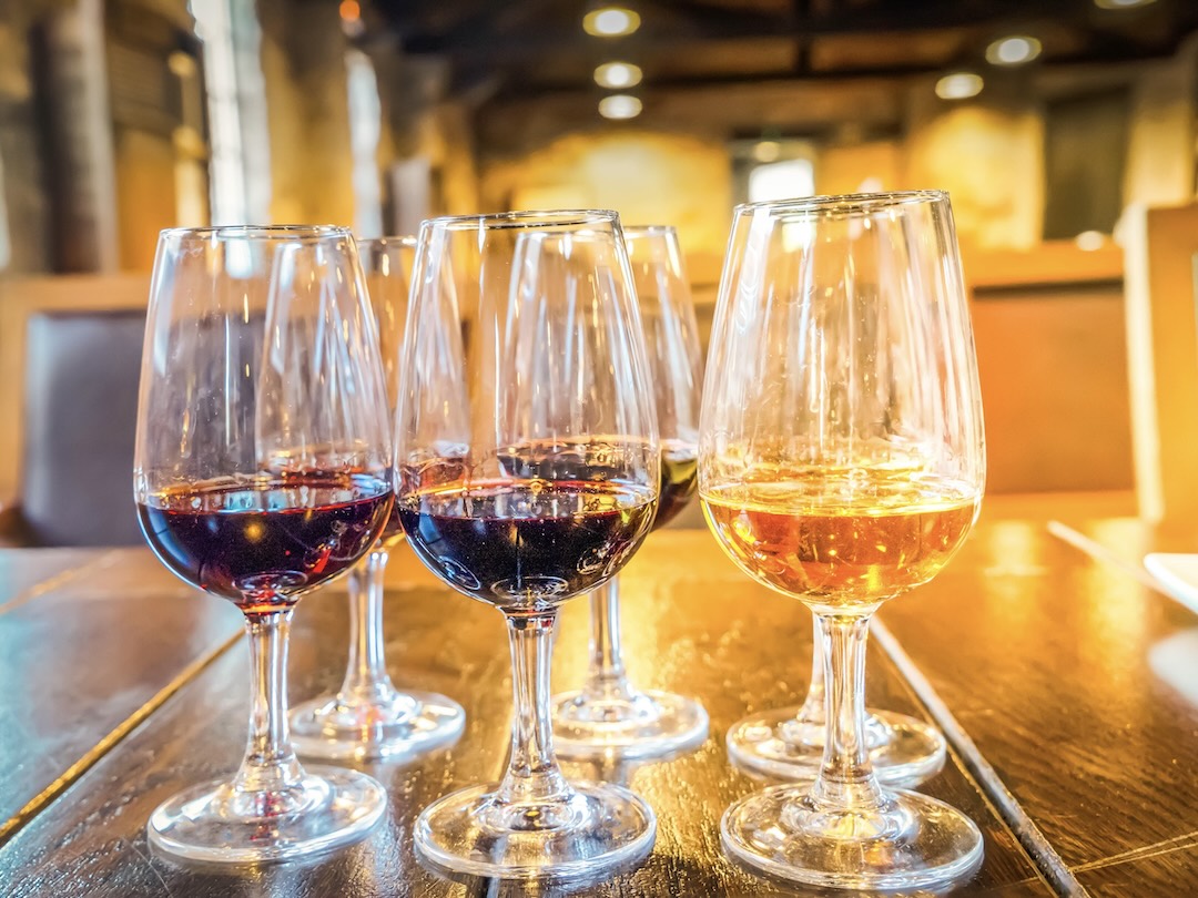 Wine tasting in The Barrel Room during the New Zealand group tour with Other Way Round Travel