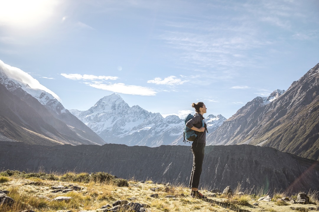 Hiking on Hooker Valley Track during the New Zealand group tour with Other Way Round Travel
