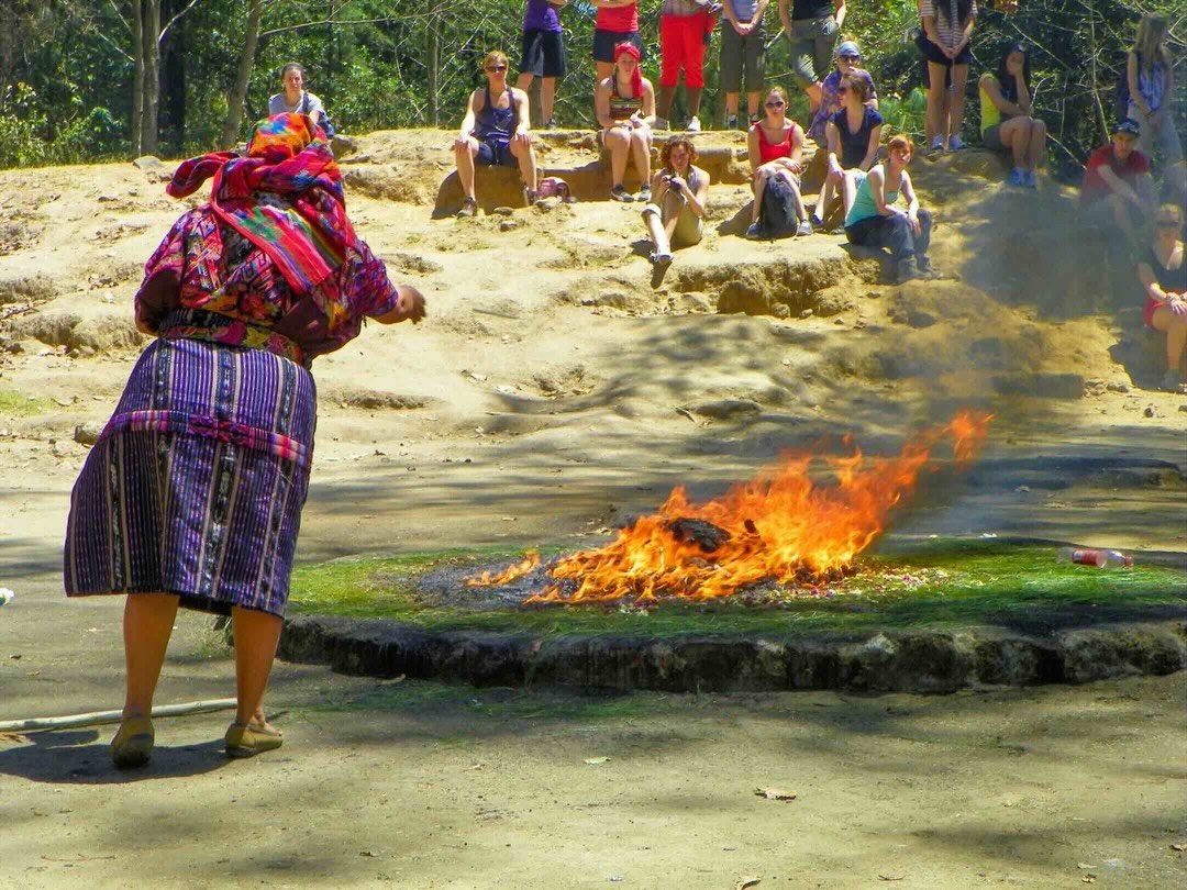 Fire ceremony at Iximché  during the Guatemala & Belize group tour with Other Way Round Travel