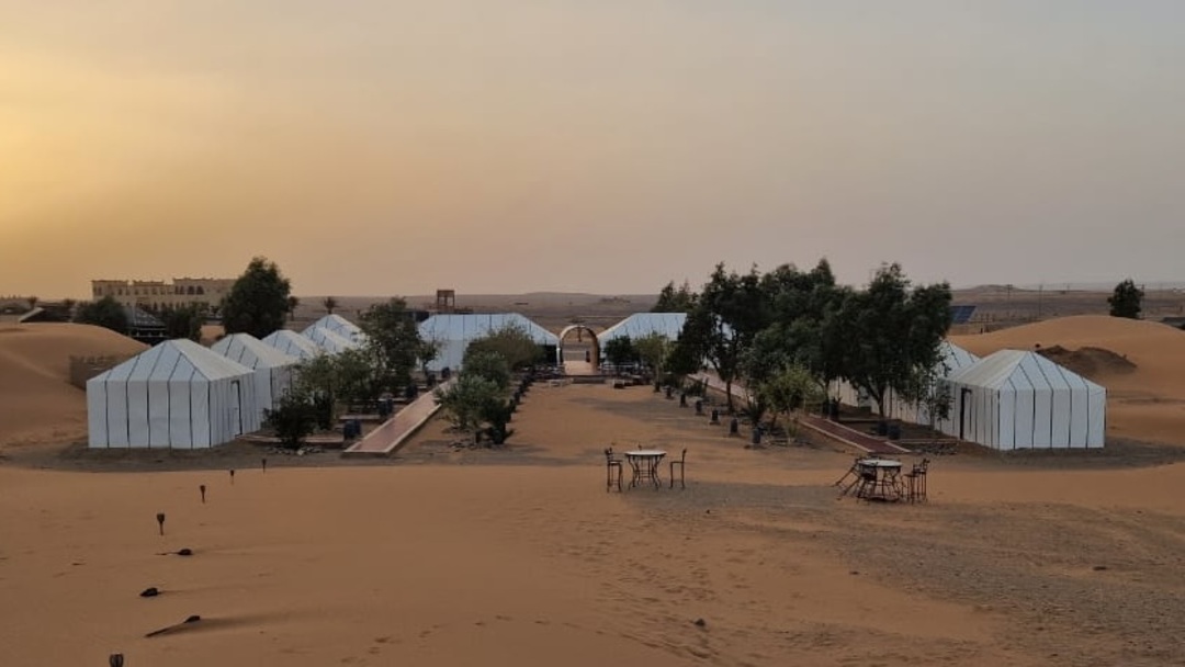 Staying in Auberge La Caravane Camp, Sahara during our group tour of Morocco